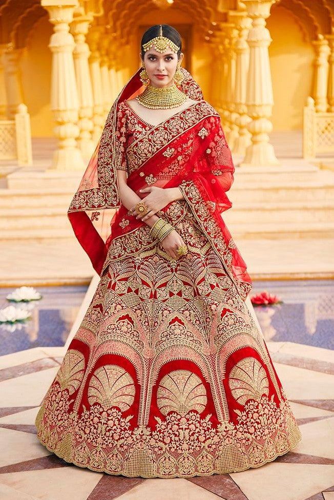 Red velvet Heavy Emroidery lehenga choli in Silk cloth with diamond work for Bridal