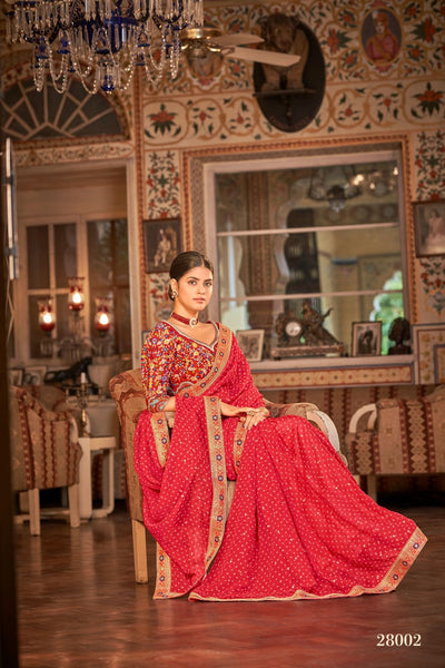 Glittering red Saree with heavy border work